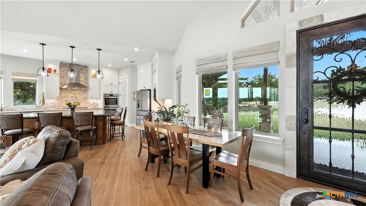 134 Stallion Estates Drive Spring Branch, TX 78070 - Photo 23 of 48 a view of a dining room with furniture window and outside view