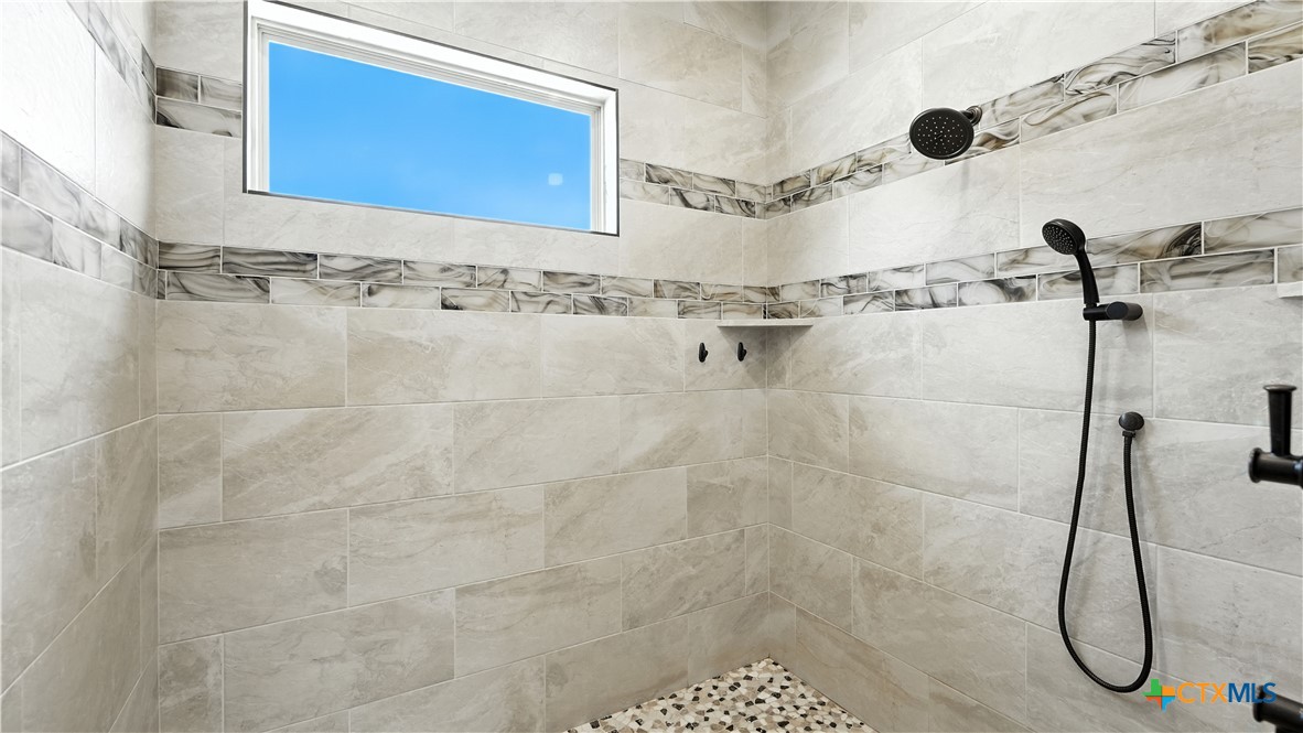 134 Stallion Estates Drive Spring Branch, TX 78070 - Photo 32 of 48 a bathroom with a shower