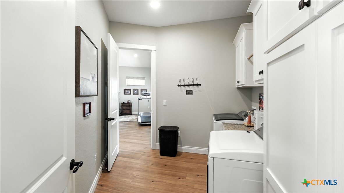 134 Stallion Estates Drive Spring Branch, TX 78070 - Photo 34 of 48 a view of living room washer and dryer