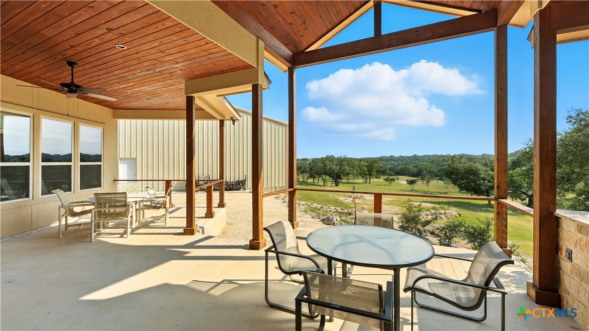134 Stallion Estates Drive Spring Branch, TX 78070 - Photo 43 of 48 a balcony with furniture and view of lake