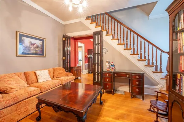 a living room with furniture with a dining table