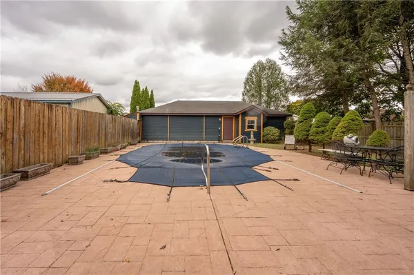 a view of a back yard of the house