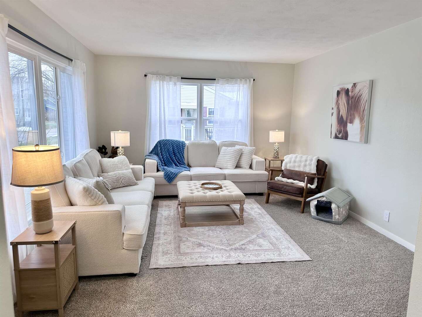 1830 28th Street Rock Island, IL 61201 - Photo 2 of 23 a living room with furniture a table and a large window