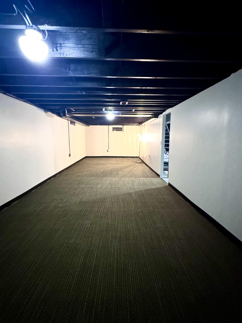 1830 28th Street Rock Island, IL 61201 - Photo 21 of 23 a view of an empty room with a window