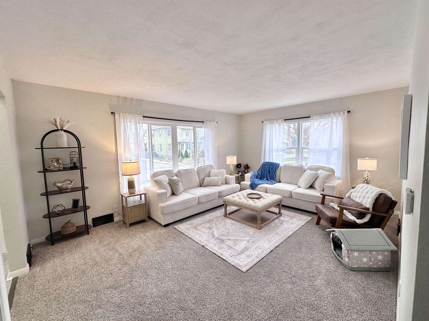 1830 28th Street Rock Island, IL 61201 - Photo 3 of 23 a living room with furniture a rug and a window