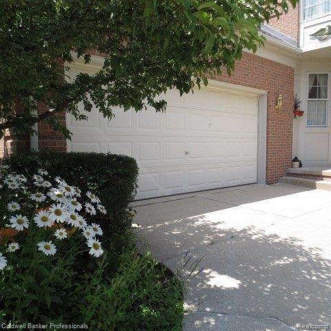 1436 Copper Circle, Unit 8 Rochester, MI 48306 - Photo 21 of 25 Garage