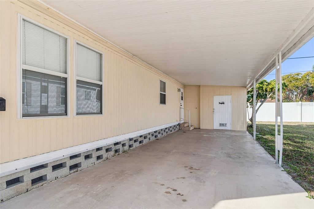 86 Pindo Palm Street West Largo, FL 33770 - Photo 2 of 45 a view of an empty room with a staircase