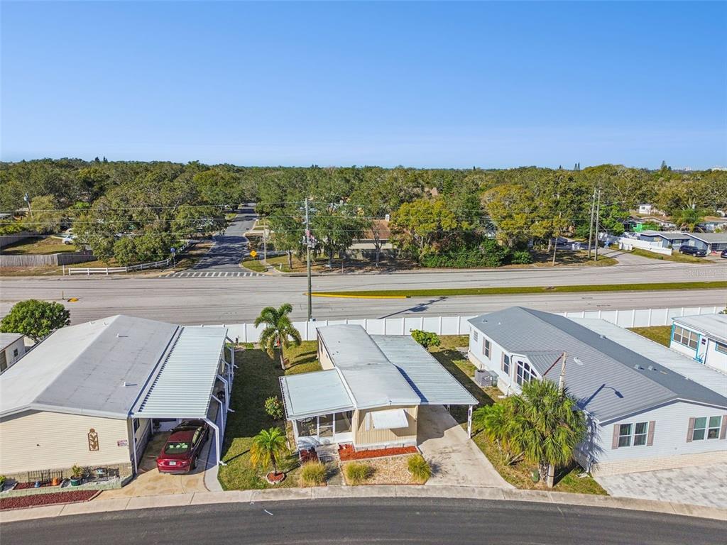 86 Pindo Palm Street West Largo, FL 33770 - Photo 22 of 45 an aerial view of residential houses with outdoor space and ocean view