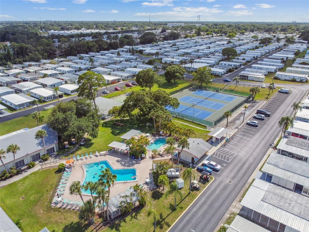 86 Pindo Palm Street West Largo, FL 33770 - Photo 28 of 45 an aerial view of a house with a swimming pool