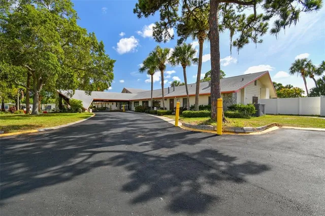 a view of a house with basketball court