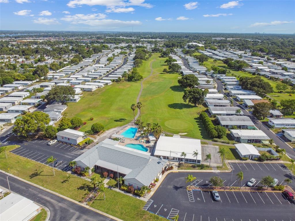 86 Pindo Palm Street West Largo, FL 33770 - Photo 40 of 45 an aerial view of residential houses with outdoor space