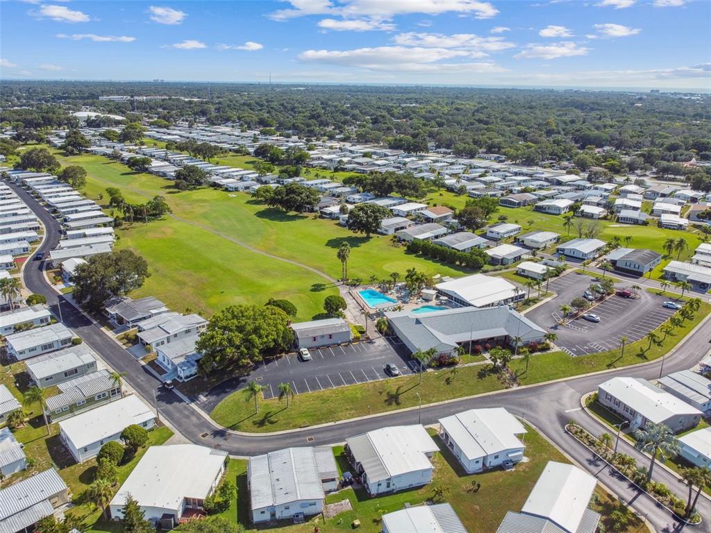 86 Pindo Palm Street West Largo, FL 33770 - Photo 41 of 45 an aerial view of residential houses with outdoor space