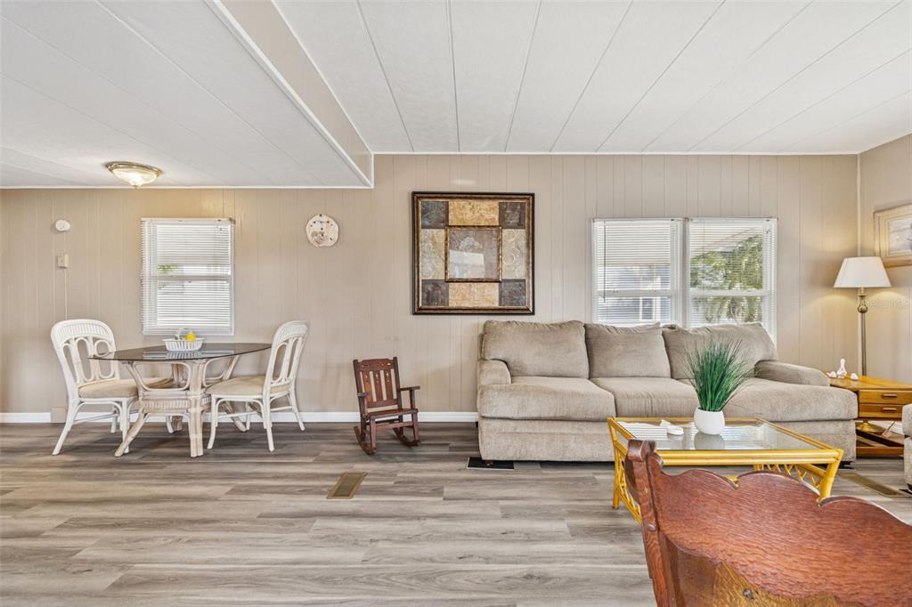86 Pindo Palm Street West Largo, FL 33770 - Photo 5 of 45 a living room with furniture and a wooden floor