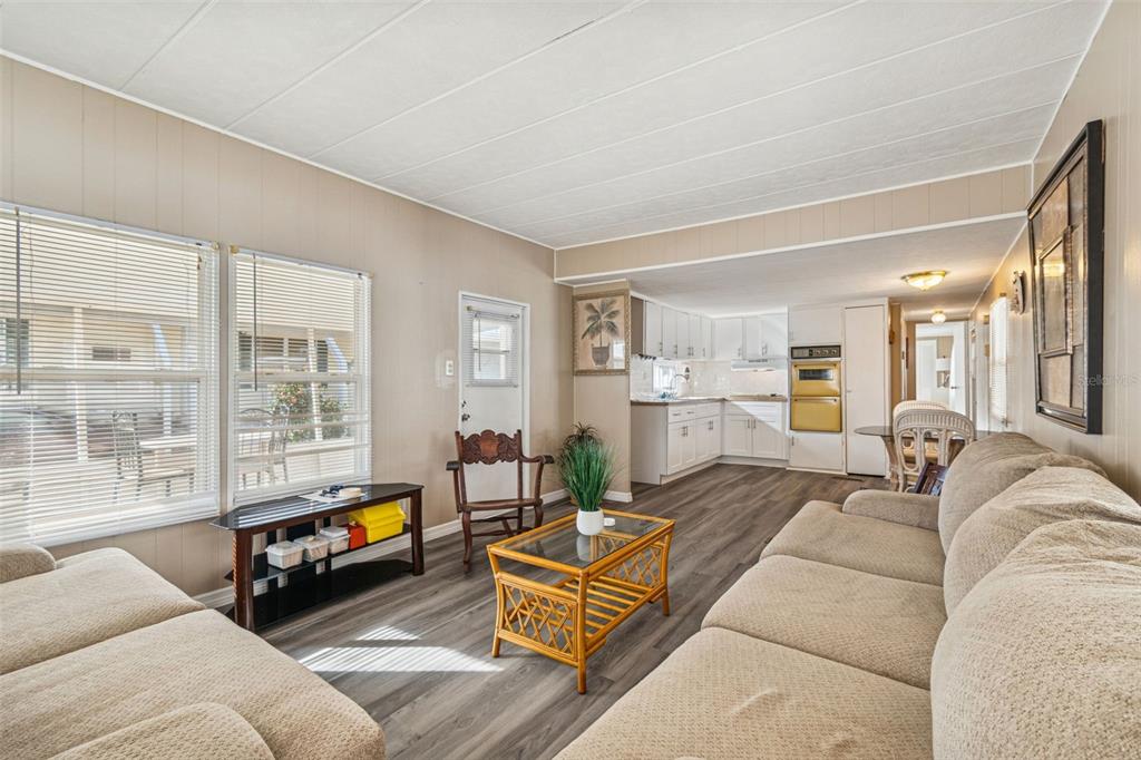 86 Pindo Palm Street West Largo, FL 33770 - Photo 8 of 45 a living room with furniture and a large window