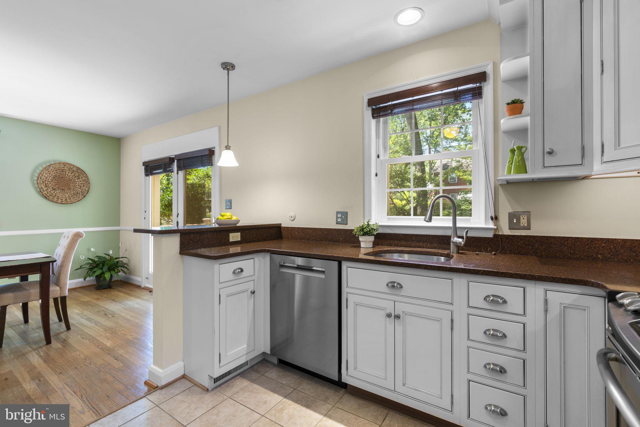 28 Dunmore Road Baltimore, MD 21228 - Photo 12 of 54 Silestone counter and stainless steel appliances