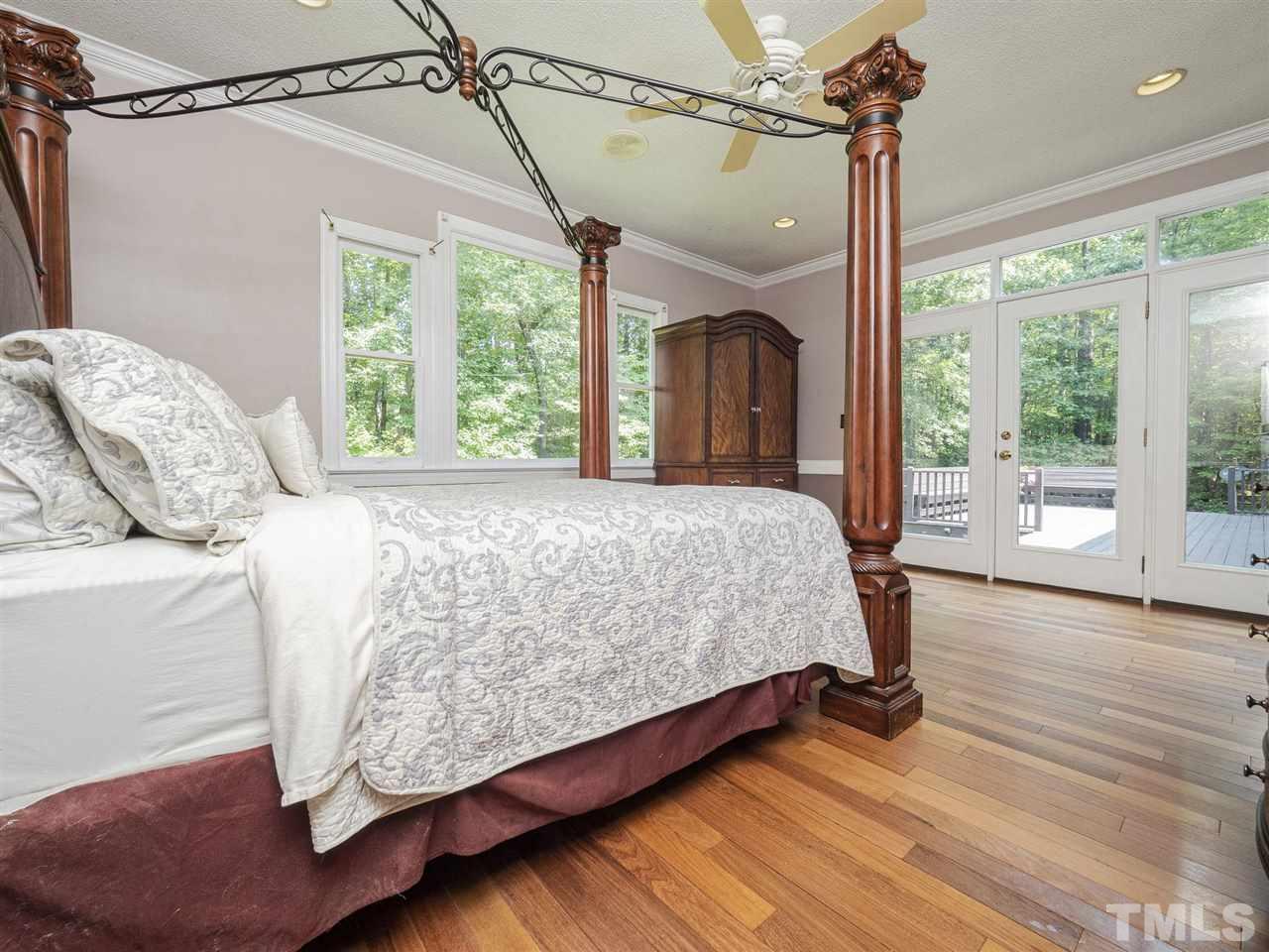 552 Tom Wright Road, Unit LO4 Franklinton, NC 27525 - Photo 13 of 30 a bed sitting in a bedroom next to a window