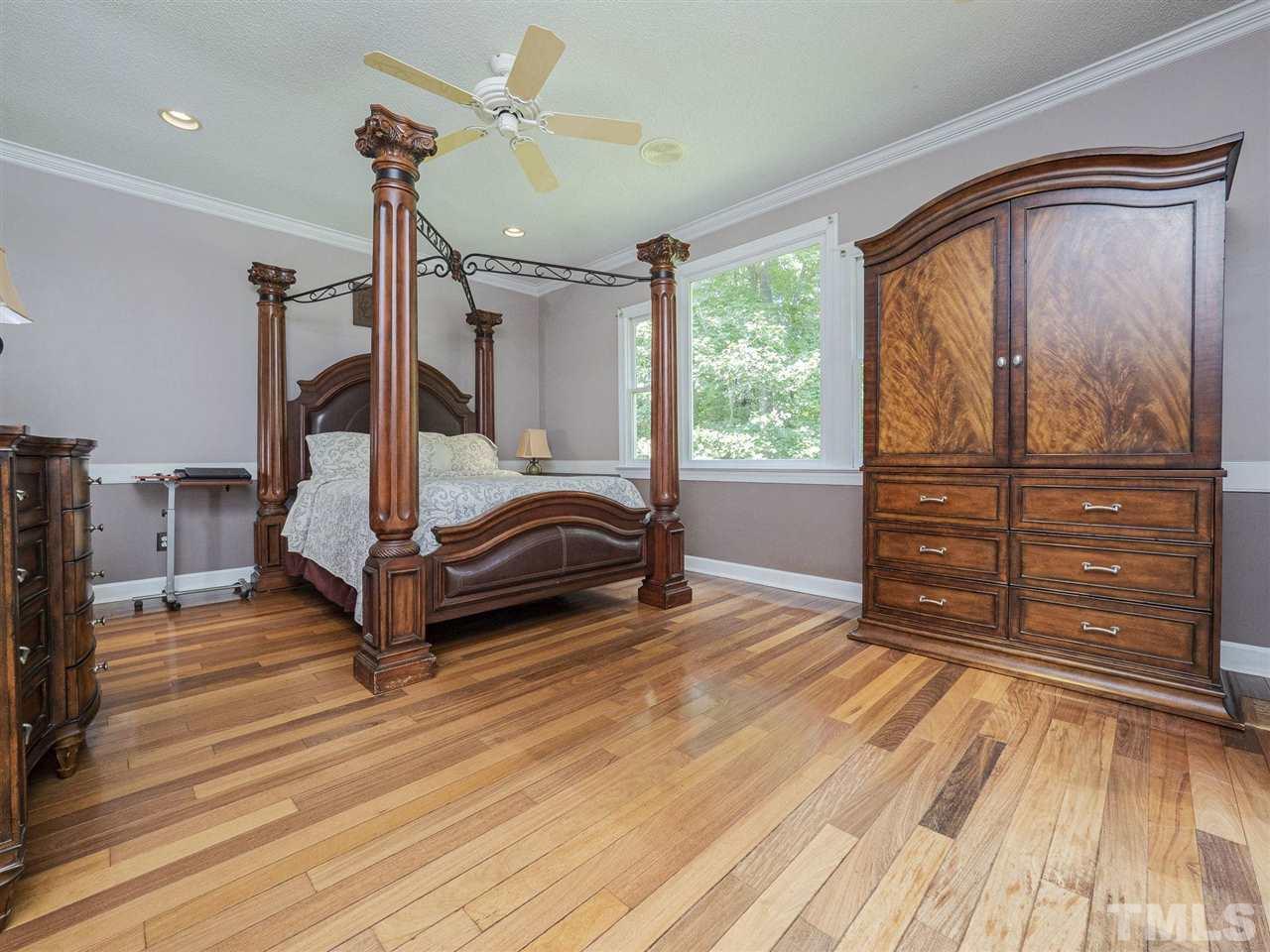 552 Tom Wright Road, Unit LO4 Franklinton, NC 27525 - Photo 14 of 30 a bedroom with a bed and a window