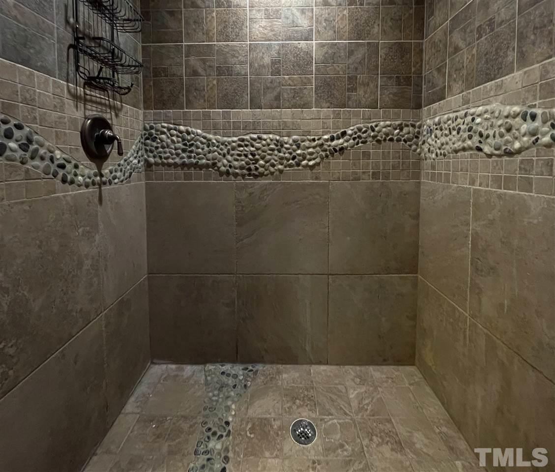 552 Tom Wright Road, Unit LO4 Franklinton, NC 27525 - Photo 18 of 30 a bathroom with a shower