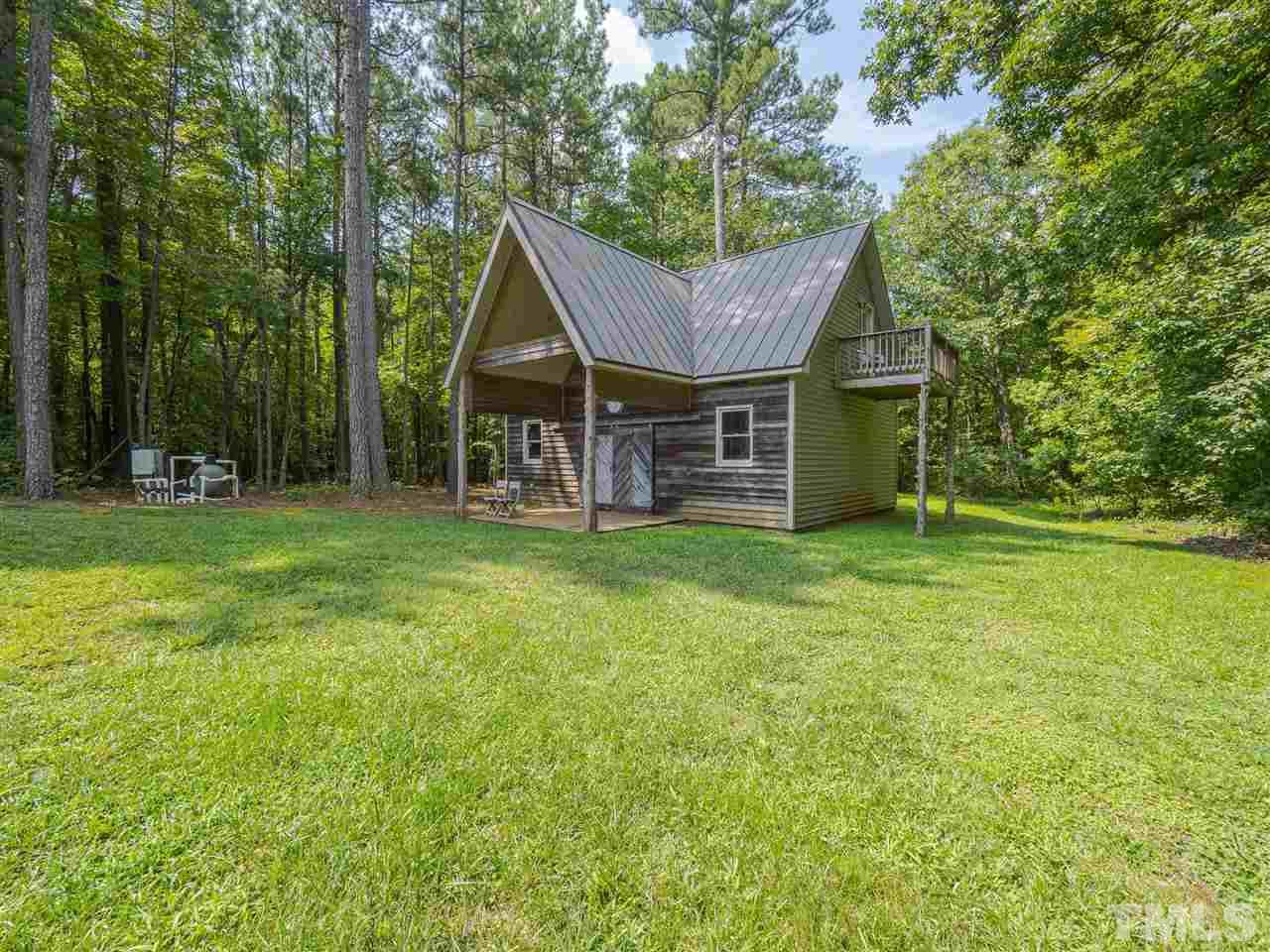 552 Tom Wright Road, Unit LO4 Franklinton, NC 27525 - Photo 20 of 30 a front view of a house with garden