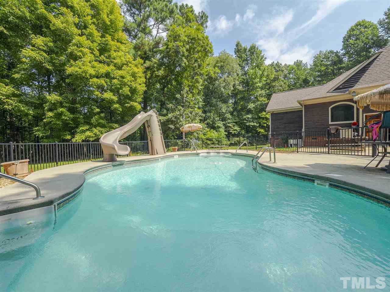 552 Tom Wright Road, Unit LO4 Franklinton, NC 27525 - Photo 21 of 30 a view of a backyard with swimming pool