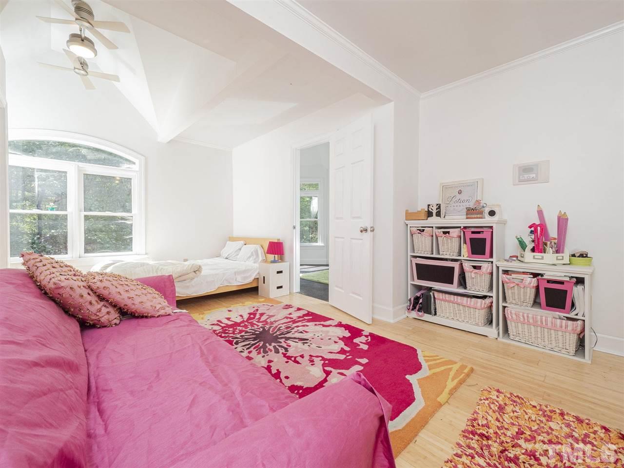 552 Tom Wright Road, Unit LO4 Franklinton, NC 27525 - Photo 27 of 30 a bedroom with a bed and a large window