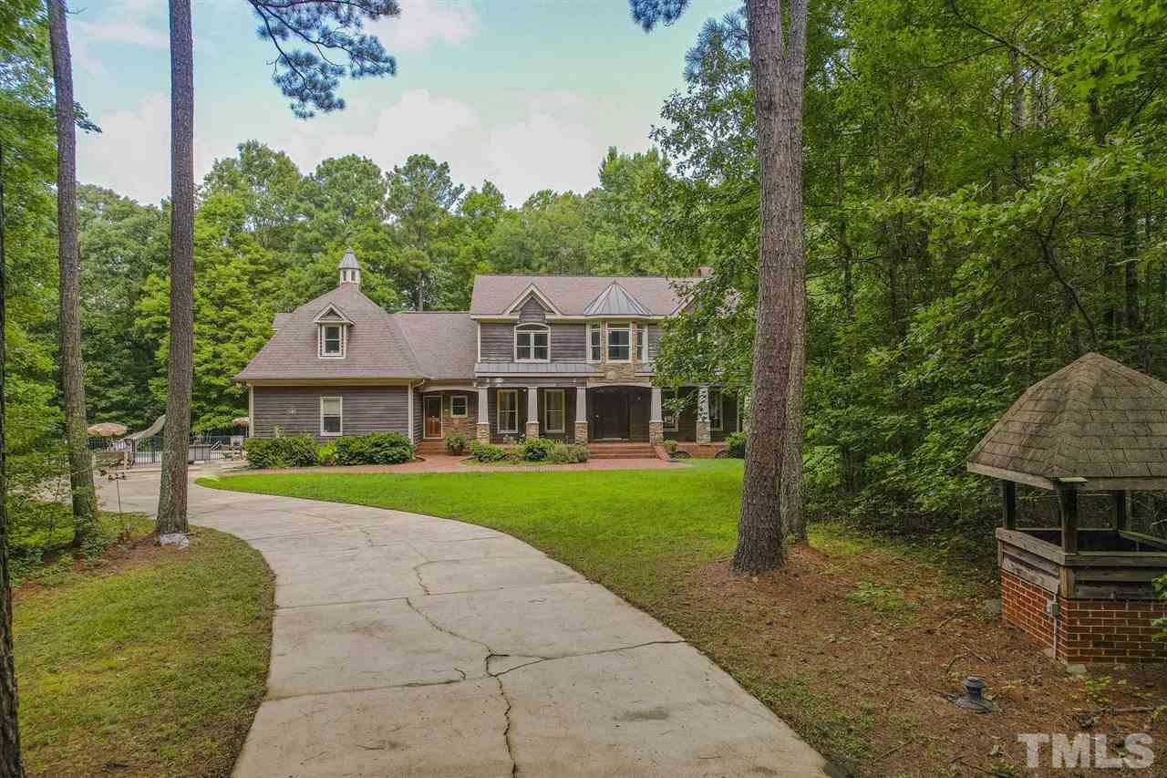 552 Tom Wright Road, Unit LO4 Franklinton, NC 27525 - Photo 30 of 30 a view of a house with a yard