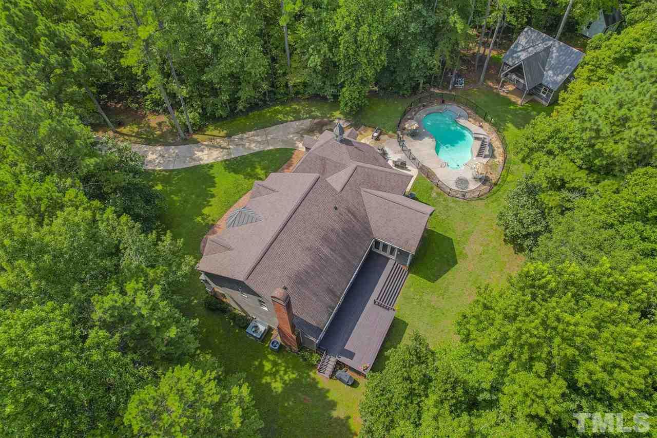 552 Tom Wright Road, Unit LO4 Franklinton, NC 27525 - Photo 4 of 30 an aerial view of a house with a swimming pool a yard and outdoor seating