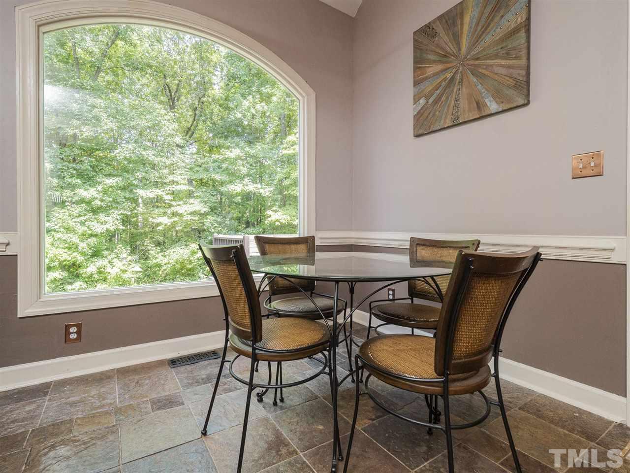 552 Tom Wright Road, Unit LO4 Franklinton, NC 27525 - Photo 10 of 30 a view of a dining room with furniture and a window