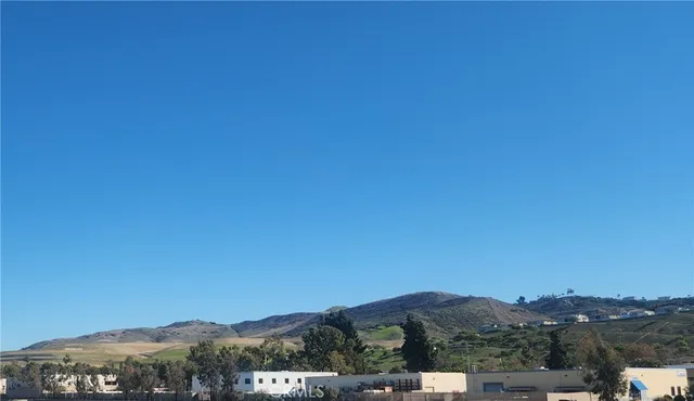 a view of a lake with a mountain in the background