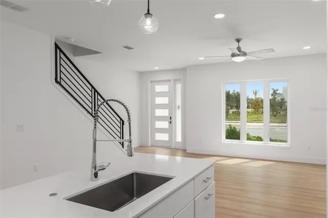 a view of walk in closet with clothes