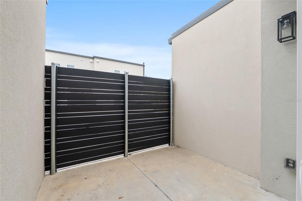 3288 Southwest 49th Terrace Gainesville, FL 32608 - Photo 22 of 71 a view of walk in closet with clothes