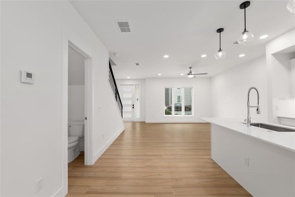 3288 Southwest 49th Terrace Gainesville, FL 32608 - Photo 26 of 71 a view of large kitchen with a sink and wooden floor