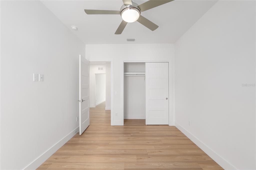 3288 Southwest 49th Terrace Gainesville, FL 32608 - Photo 45 of 71 a view of empty room with wooden floor