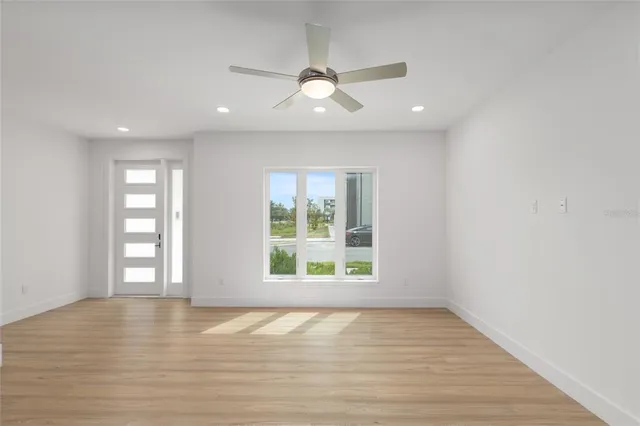 a view of a kitchen with a sink and a kitchen view