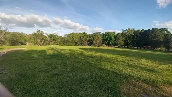a view of an outdoor space with a lake view