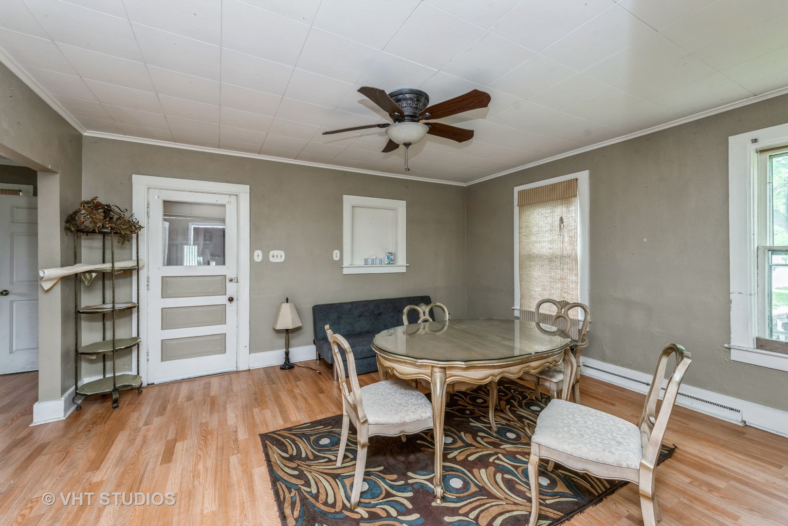 2517 Johnsburg Road Johnsburg, IL 60051 - Photo 5 of 11 a dining room with wooden floor and a window