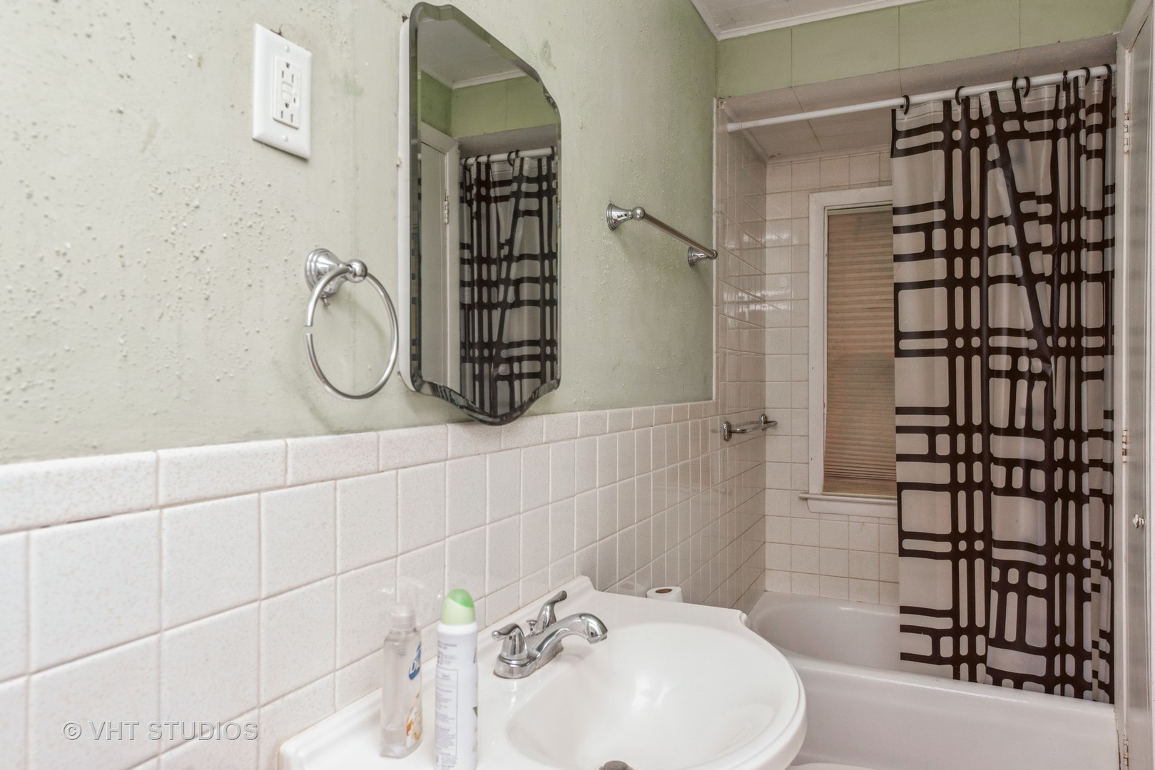2517 Johnsburg Road Johnsburg, IL 60051 - Photo 7 of 11 a bathroom with a sink toilet and shower