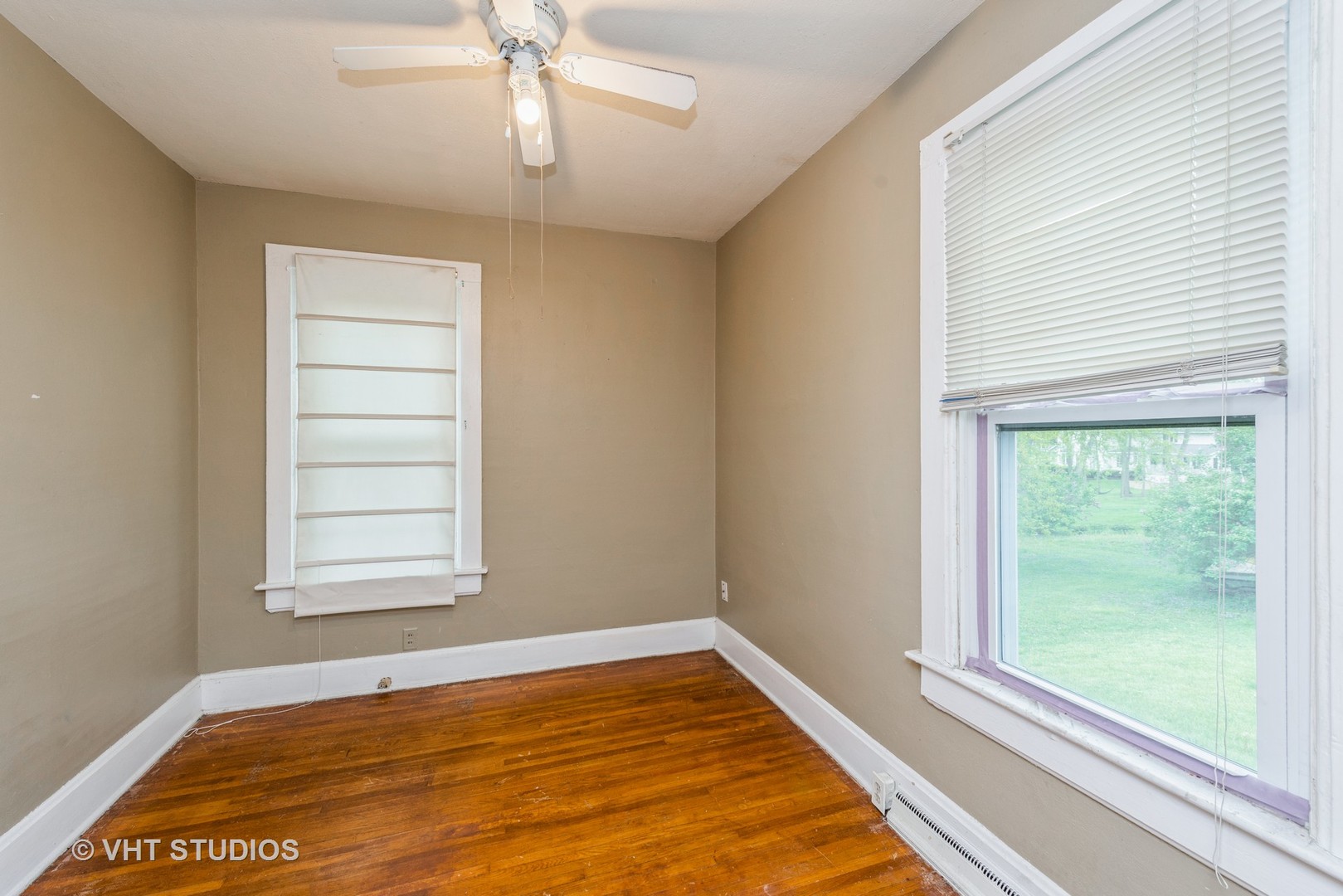 2517 Johnsburg Road Johnsburg, IL 60051 - Photo 9 of 11 a view of a room with window and wooden floor