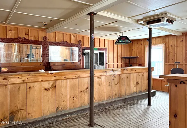 a kitchen with cabinets and a stove