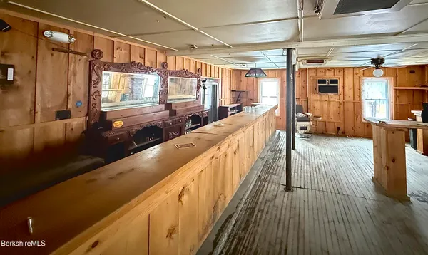a kitchen with stainless steel appliances a refrigerator and a sink