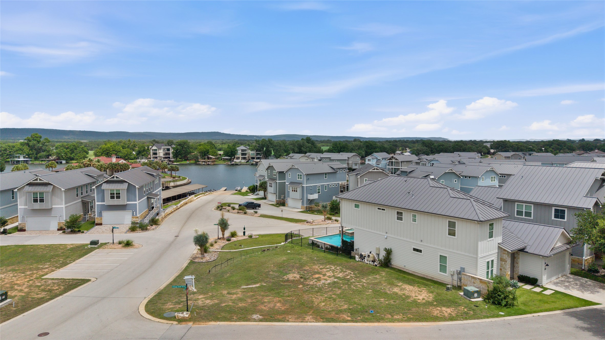 Corner lot - ready to build a 2 story home with pool and yard - great view of Lake LBJ