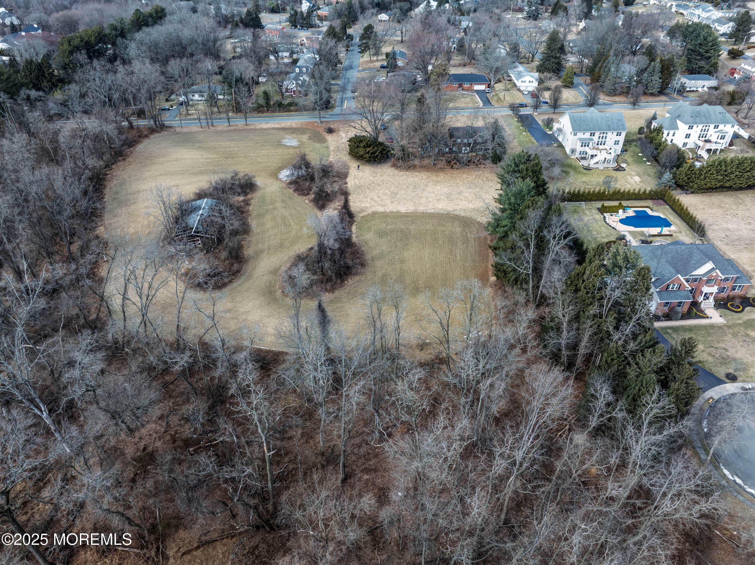 16 Pleasant Valley Road Morganville, NJ 07751 - Photo 13 of 18 an aerial view of a houses with yard