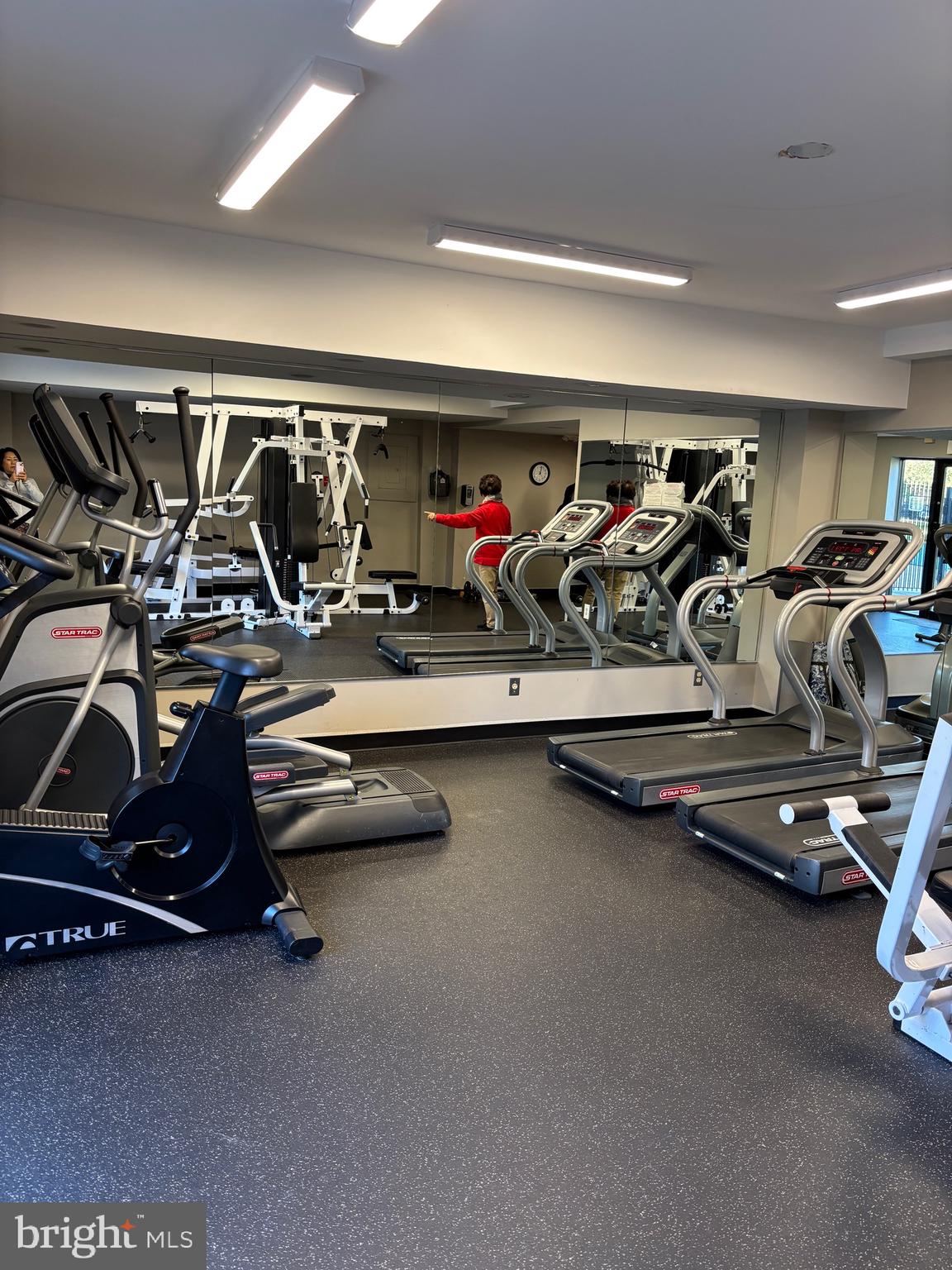 10570 Main Street, Unit 424 Fairfax, VA 22030 - Photo 15 of 18 a view of a room with gym equipment