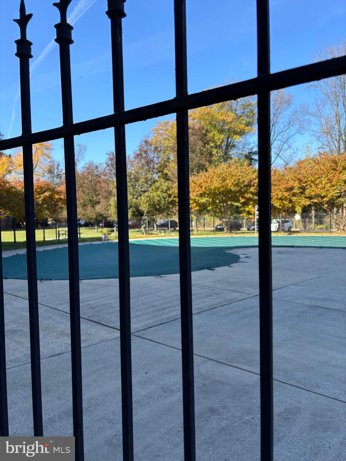 10570 Main Street, Unit 424 Fairfax, VA 22030 - Photo 16 of 18 a view of an empty room with a floor to ceiling window