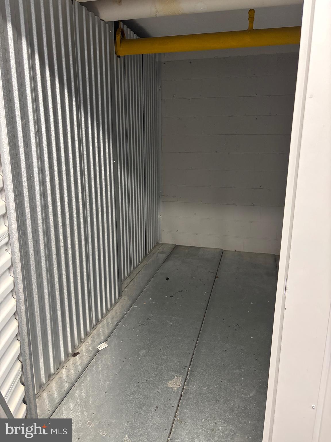 10570 Main Street, Unit 424 Fairfax, VA 22030 - Photo 18 of 18 a view of a room with wooden floor