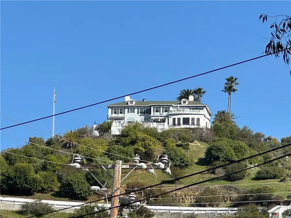 a view of a house with a street