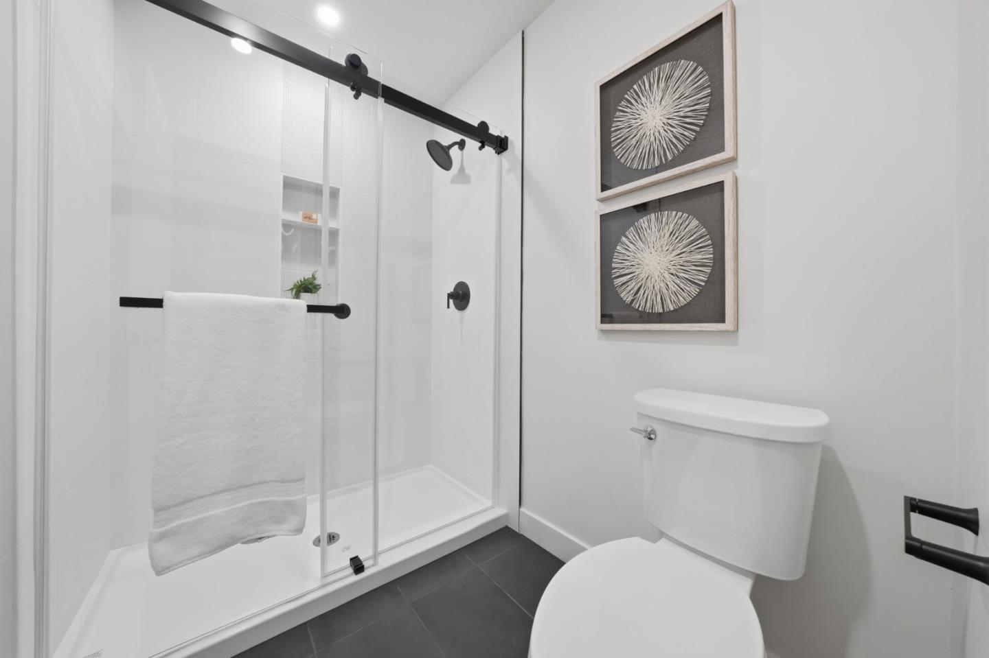409 Puerto Place Hayward, CA 94541 - Photo 33 of 54 a white toilet sitting next to a bathroom