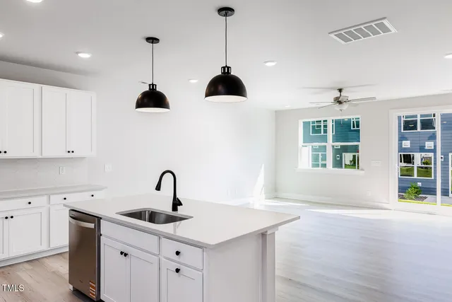 a view of kitchen with microwave and stove