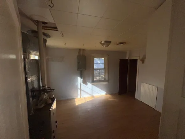 a view of a hallway with a window