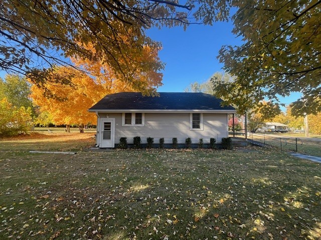 2025 East Pythian Avenue Decatur, IL 62526 - Photo 14 of 15 a front view of a house with a yard